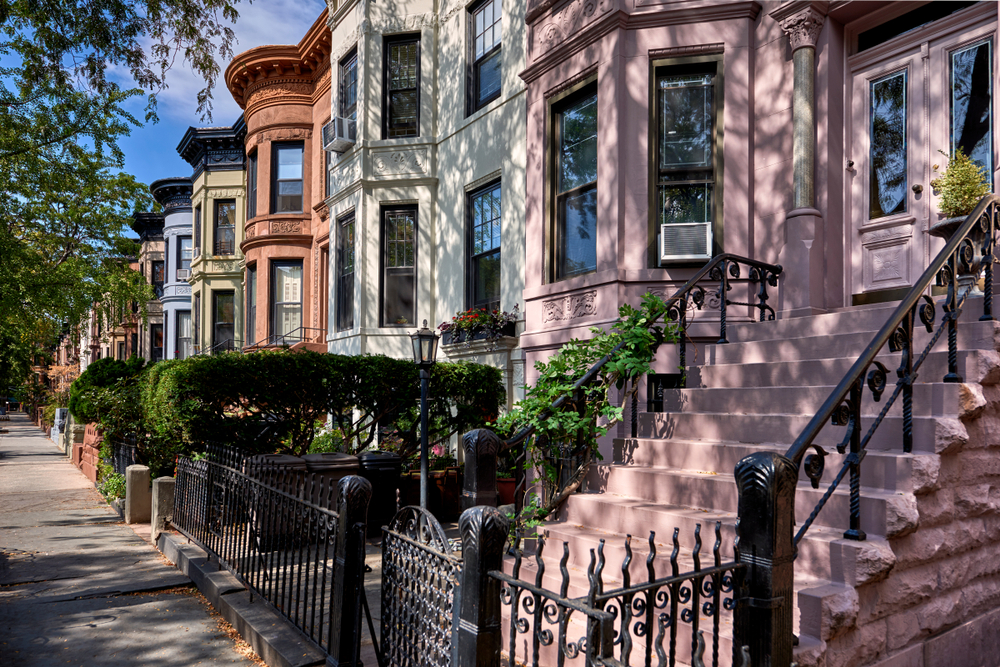 A,Row,Of,Brownstone,Buildings,And,Stoops,In,An,Iconic